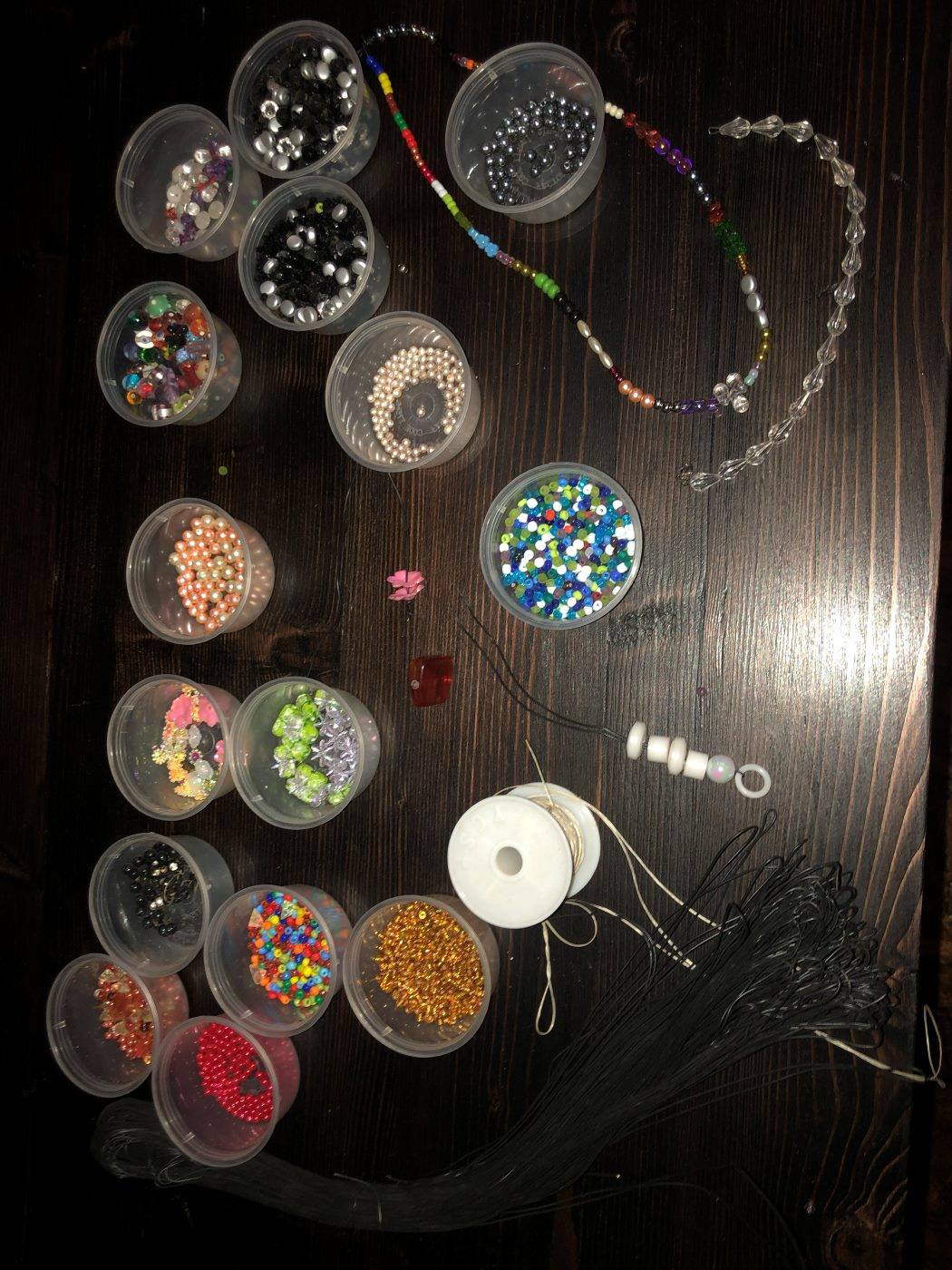 Beads and threads laid out for making keyrings