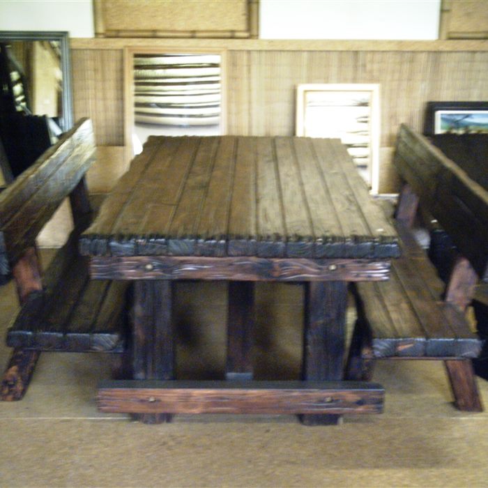 A dining table with two benches