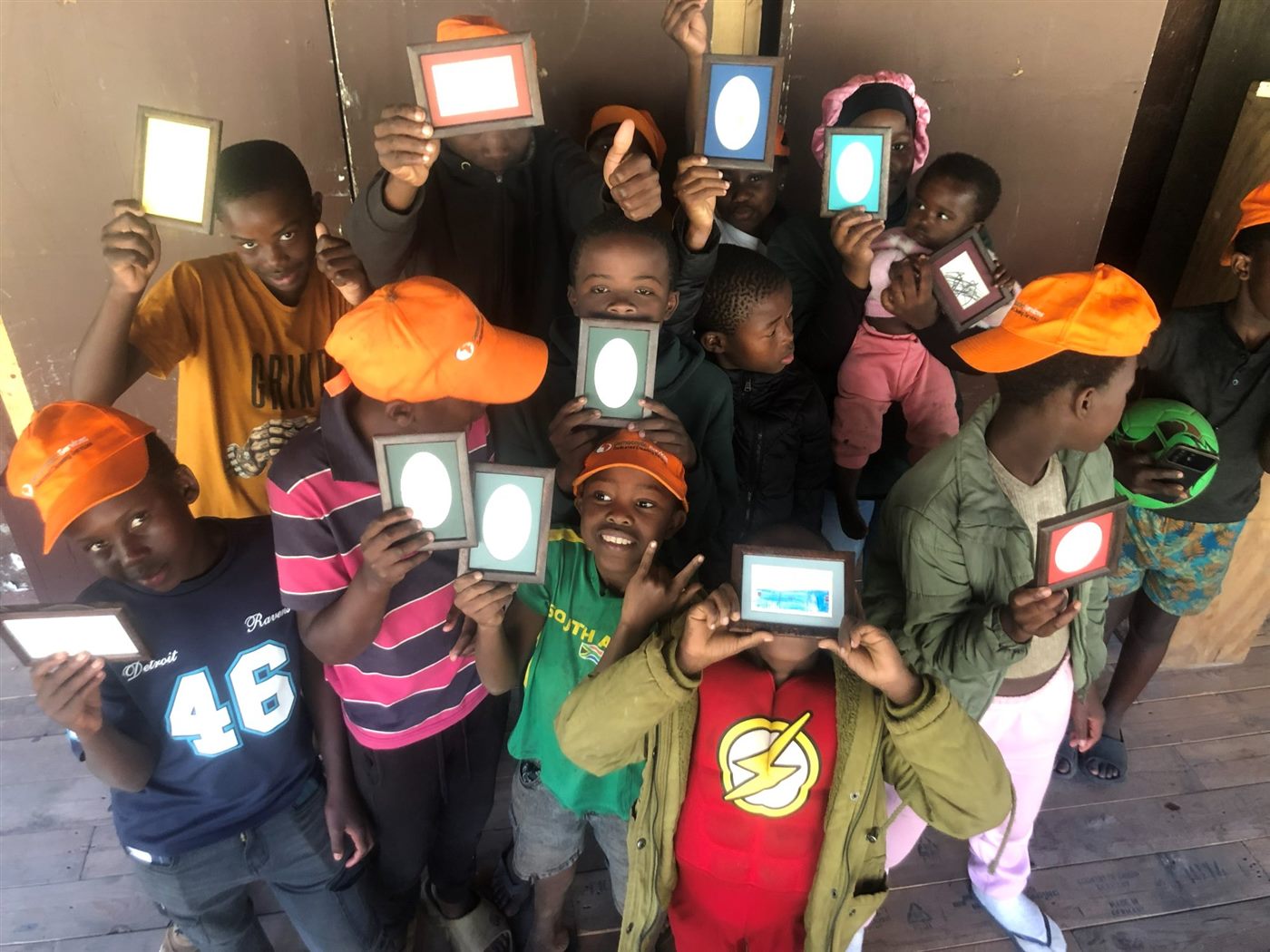 Children with the frames they made