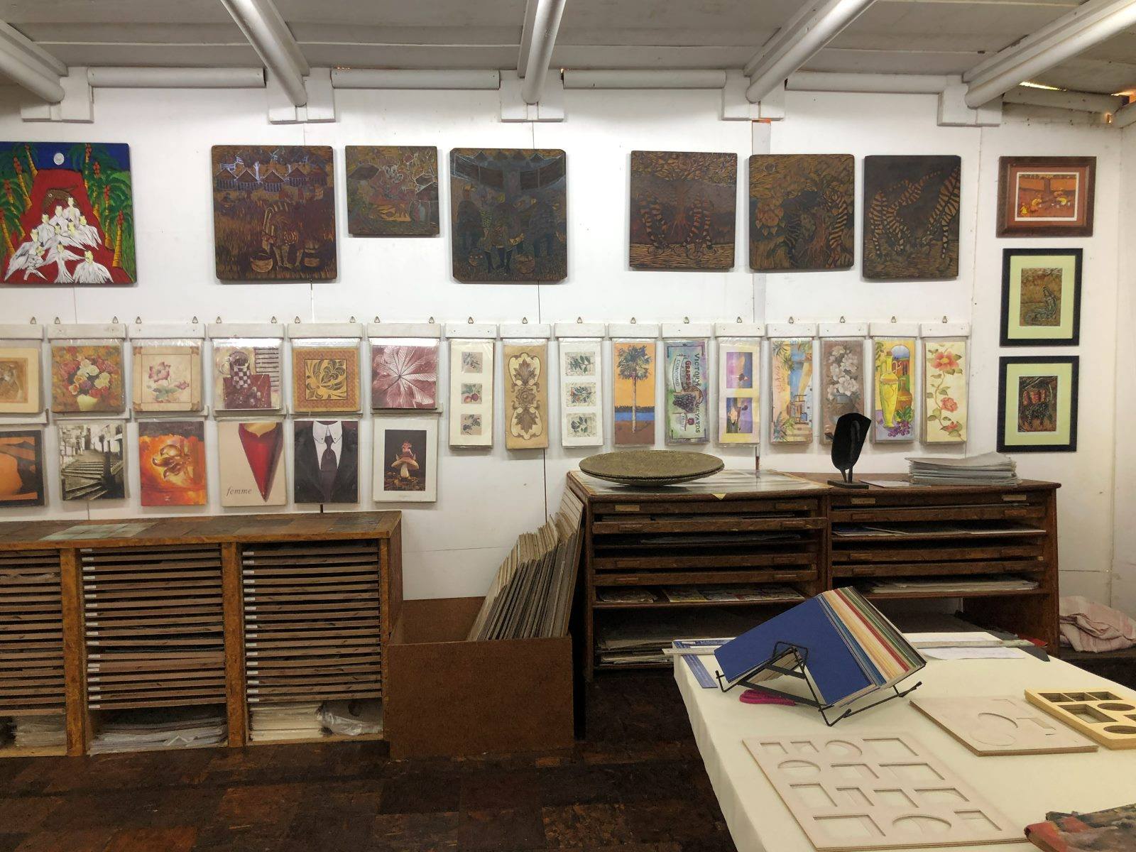 A wall of art prints and posters