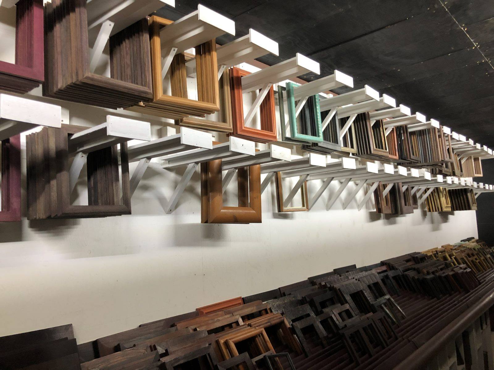Ready-made frames hanging in rows