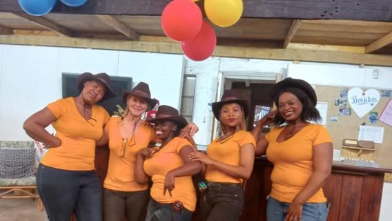 The Heart Eco sales team at the counter, smiling