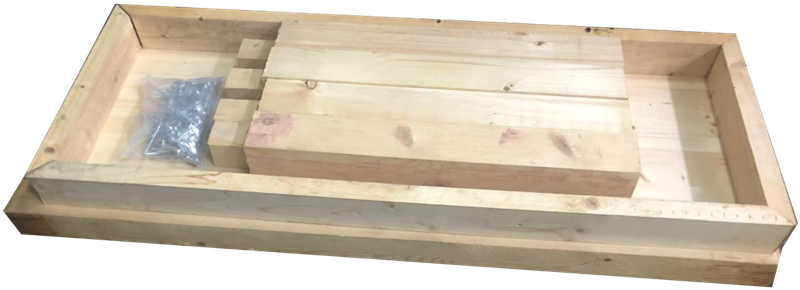 A table as a flat pack: the frame, the legs and the top boards, cut and ready, with a bag of screws